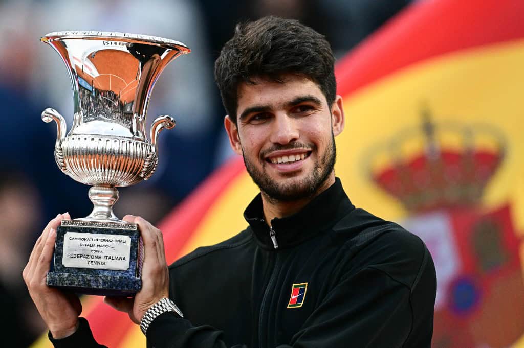 Spain's Carlos Alcaraz shows his winner trophy