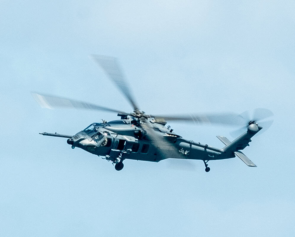 A military helicopter flies during an airshow. Reports on the Guatemala-U.S. security agreement have not specified what aircraft would be used in possible joint operations.