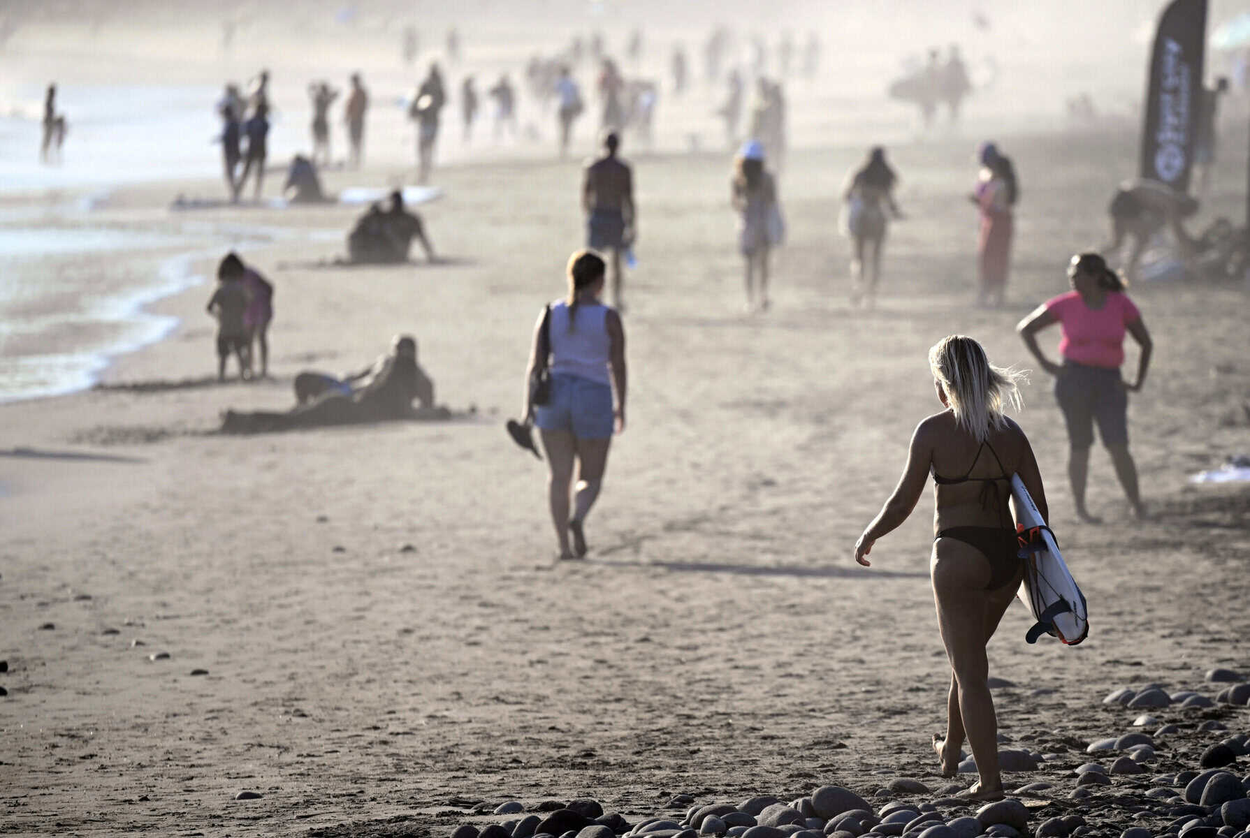 Tourists enjoy El Tunco beach, in La Libertad, El Salvador