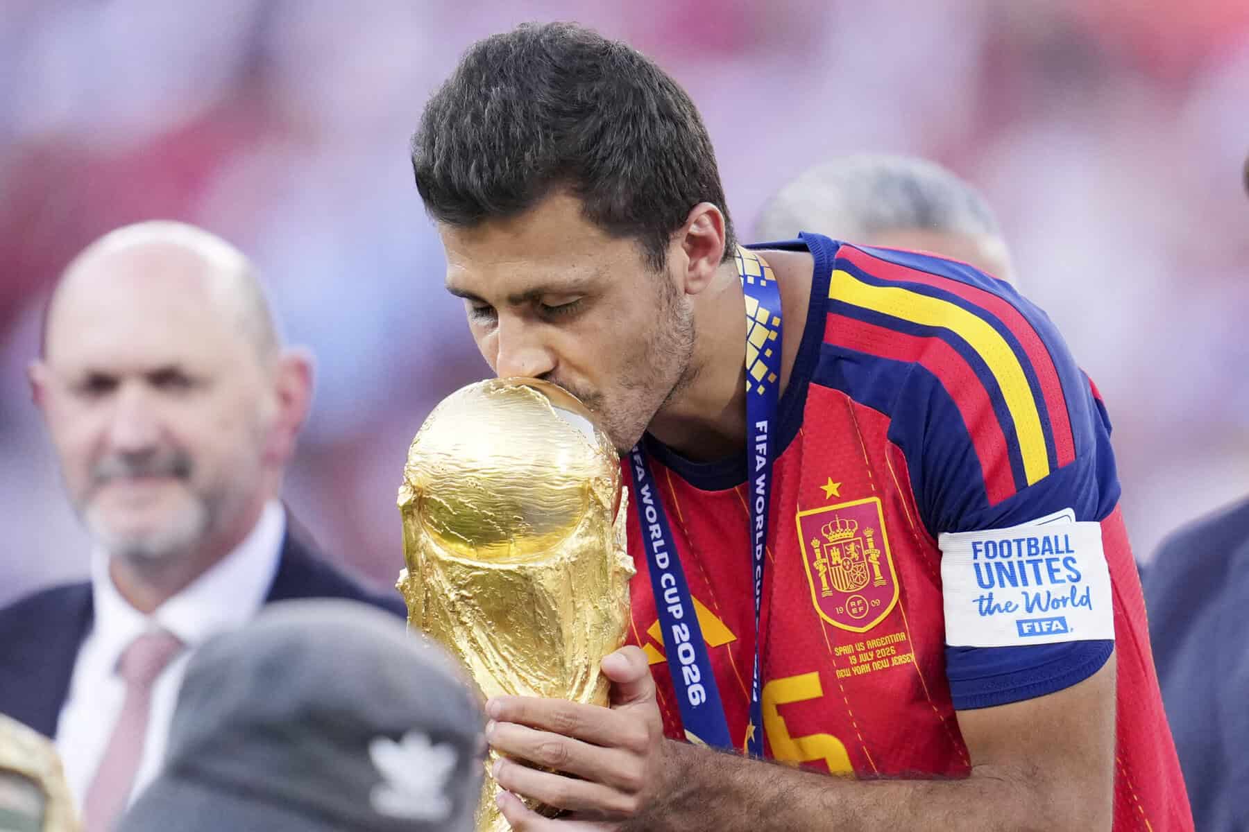 Spain captain Rodri kisses the World Cup trophy after Sunday's final, watched by thousands across Costa Rica