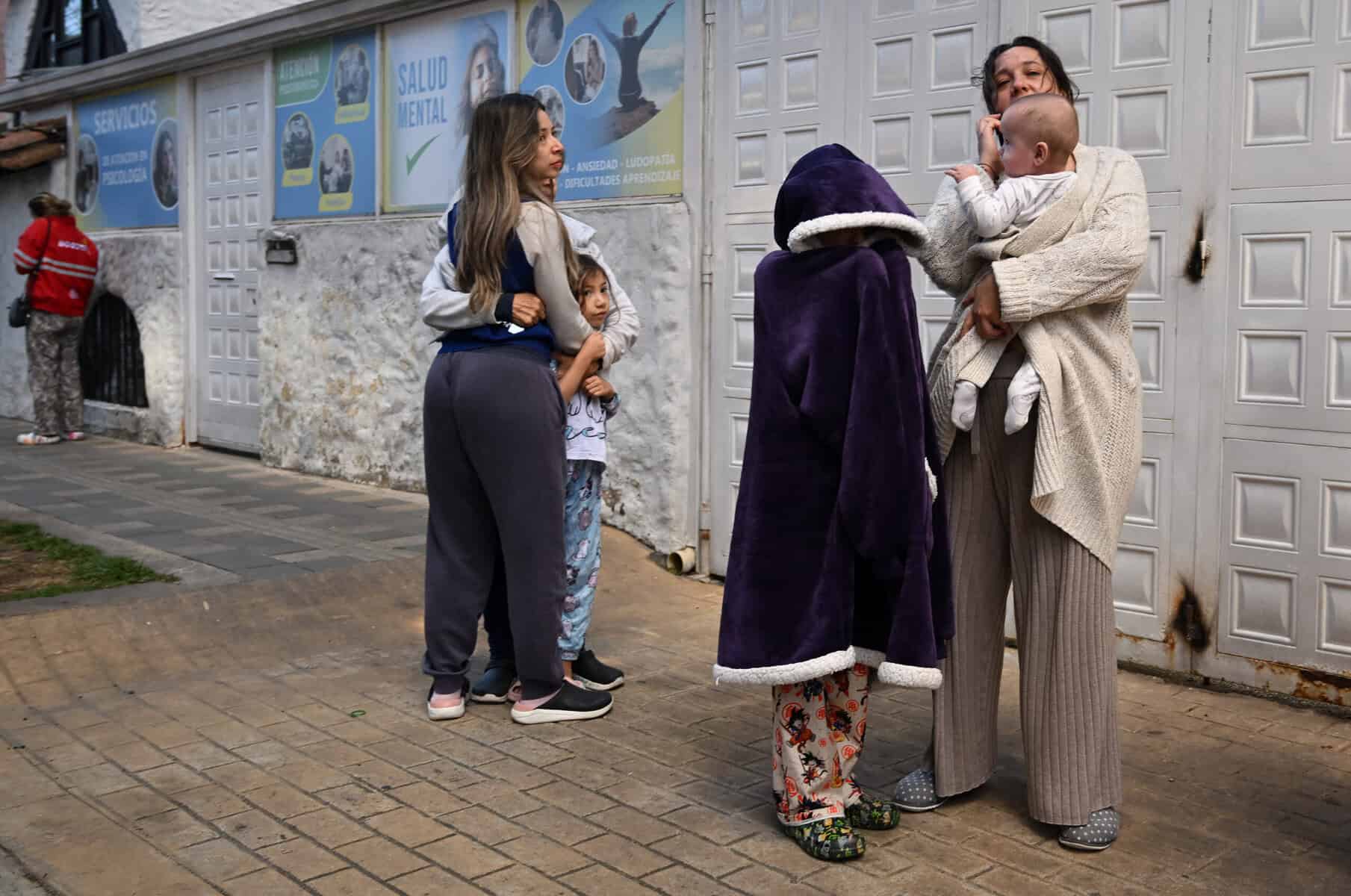 People evacuate after an earthquake in Bogota