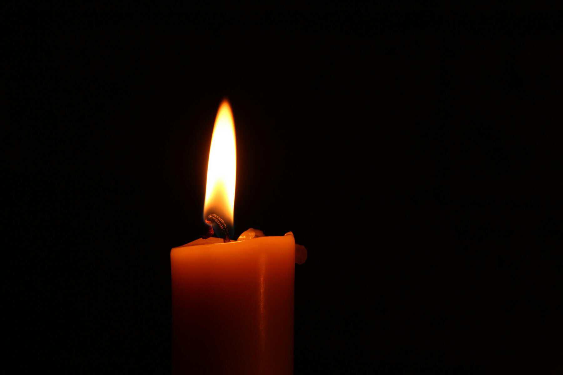 Candle burns after the passing of Germany's Mario Genz in Costa Rica