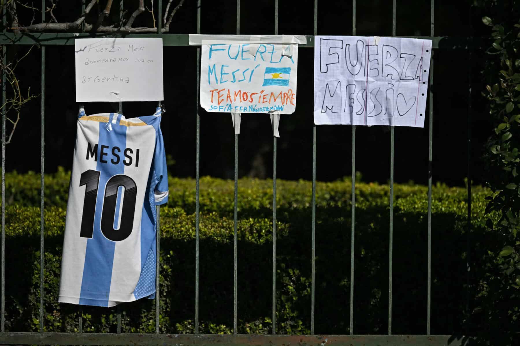 A jersey and signs reading 