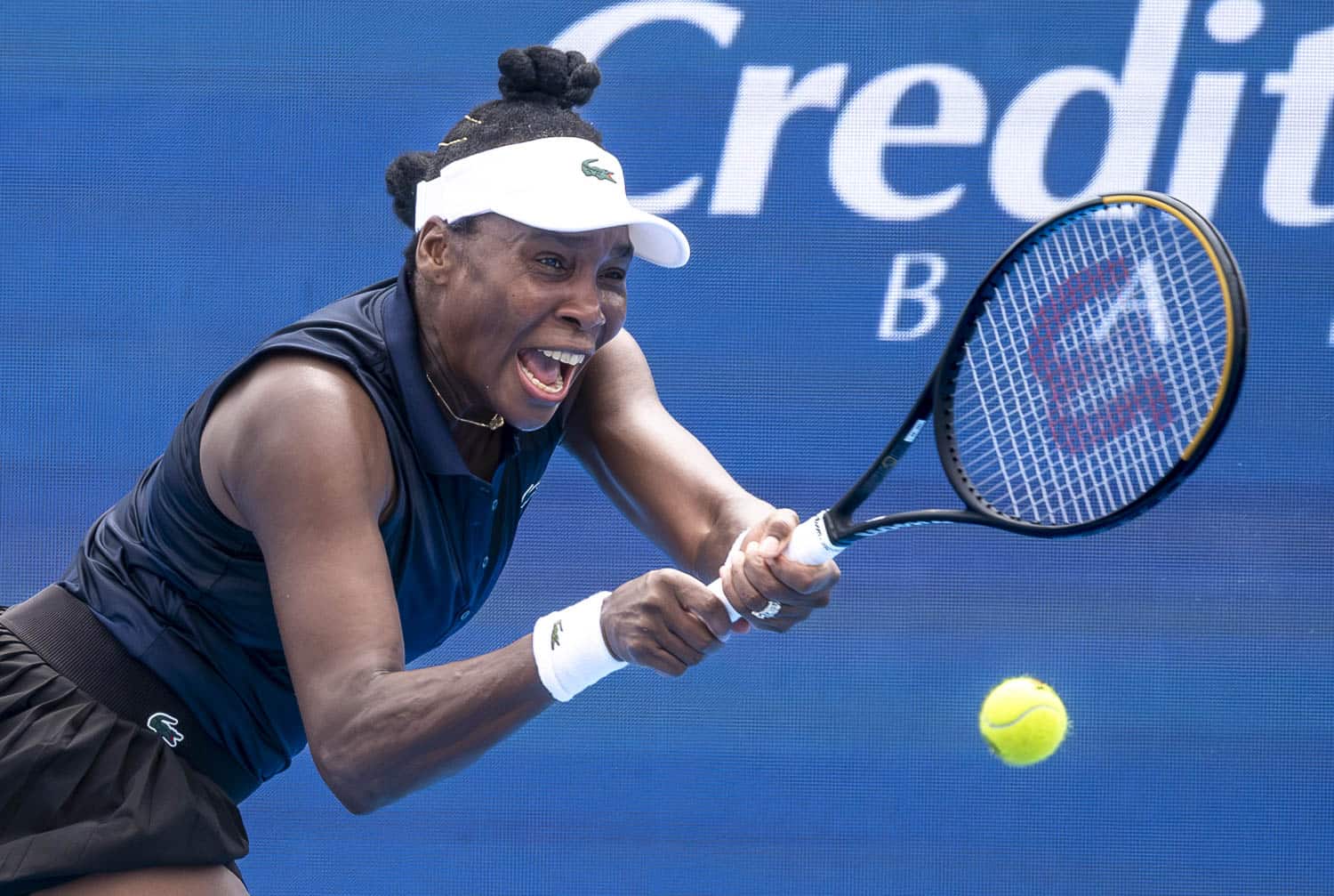 Venus Williams hits a return at the Cincinnati Open