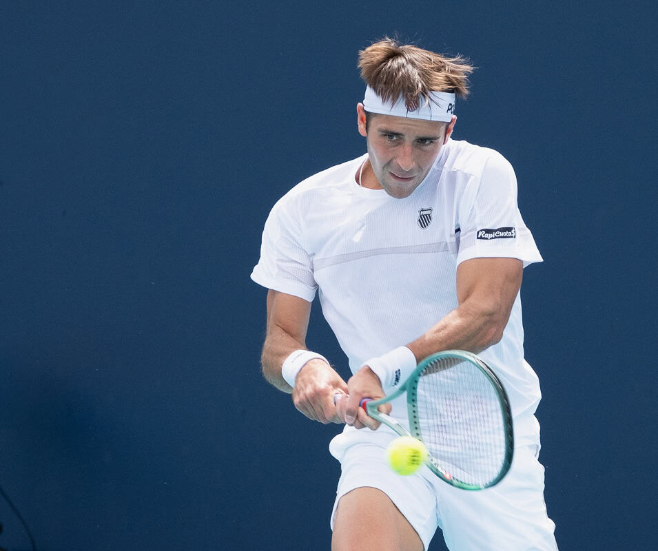 Tomás Martín Etcheverry hits a return at the Australian Open 2026